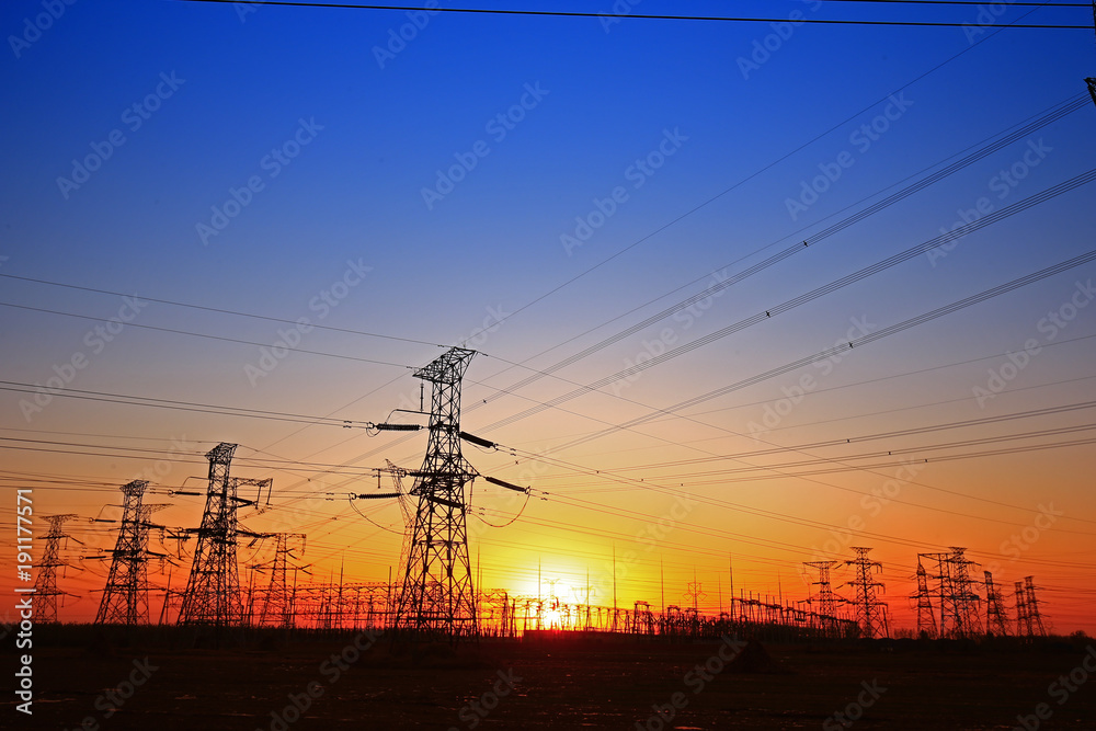 Sunset silhouette of pylon