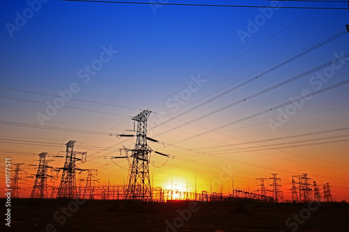 Sunset silhouette of pylon