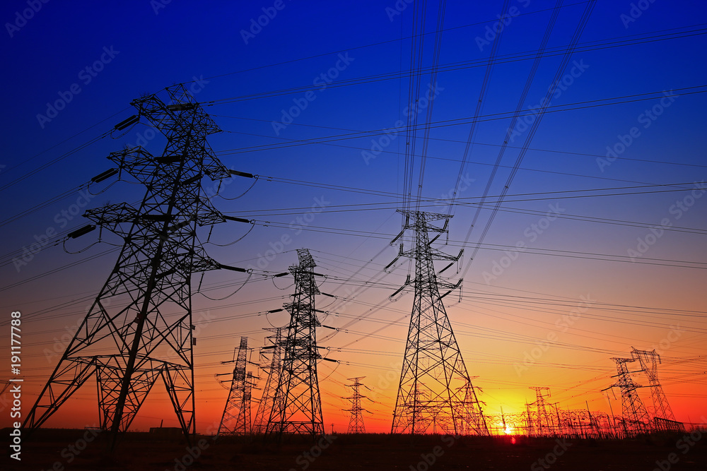 Fototapeta premium Sunset silhouette of pylon