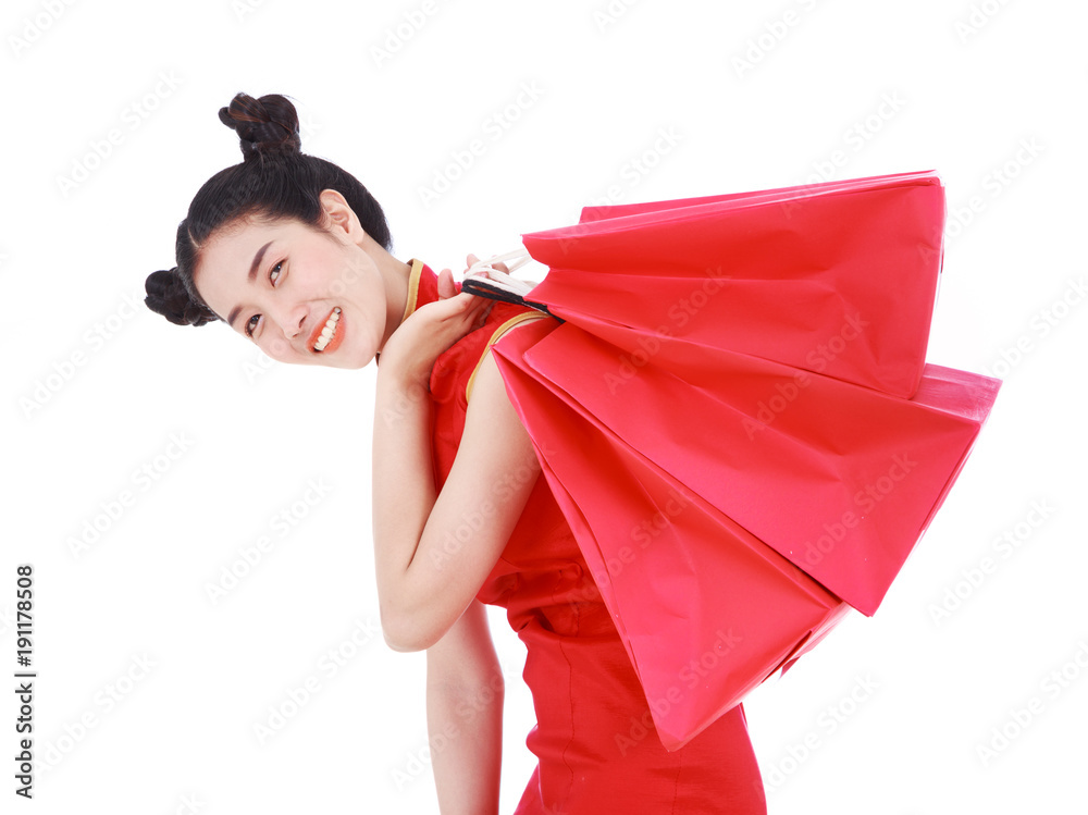 woman holding shopping bag on chinese new year celebration isolated on white background woman holding shopping bag on chinese new year celebration isolated on white background