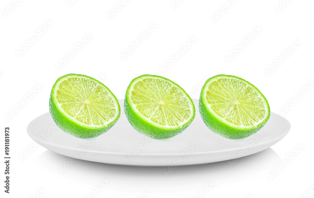 Piece lemon in white plate on white background Piece lemon in white plate on white background