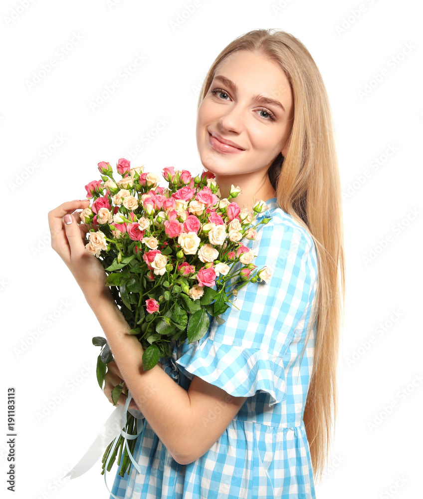 Beautiful young woman with bouquet of roses on white background