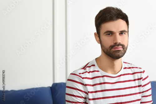 Young bearded man in casual...