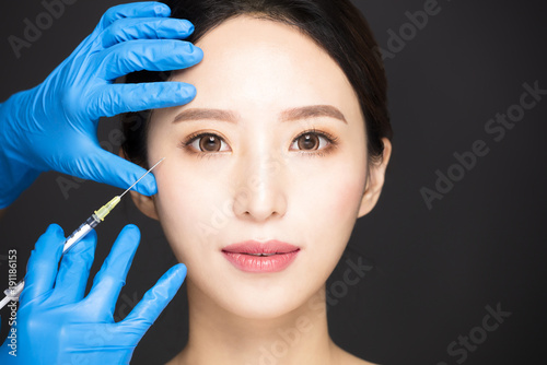 Obraz na plátně closeup young woman face with medical beauty concept.