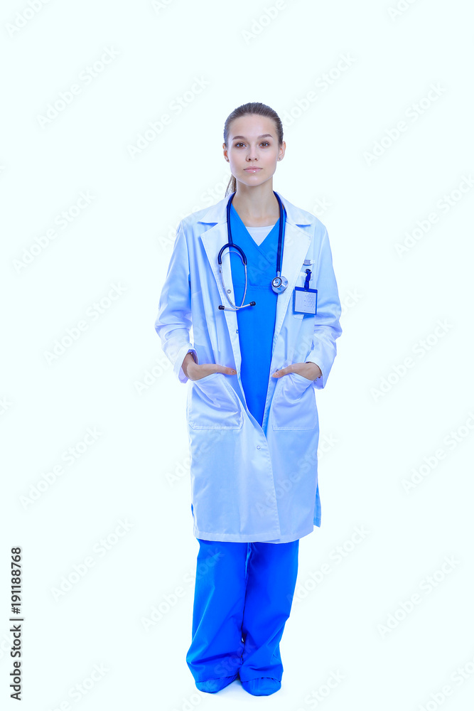 Beautiful young woman in white coat posing with hand in pocket. Woman doctor Beautiful young woman in white coat posing with hand in pocket. Woman doctor