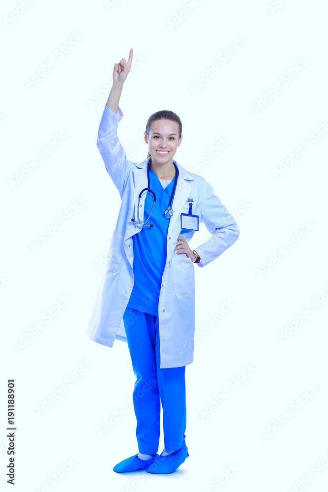 Beautiful young woman in white coat posing with hand in pocket. Woman doctor Beautiful young woman in white coat posing with hand in pocket. Woman doctor