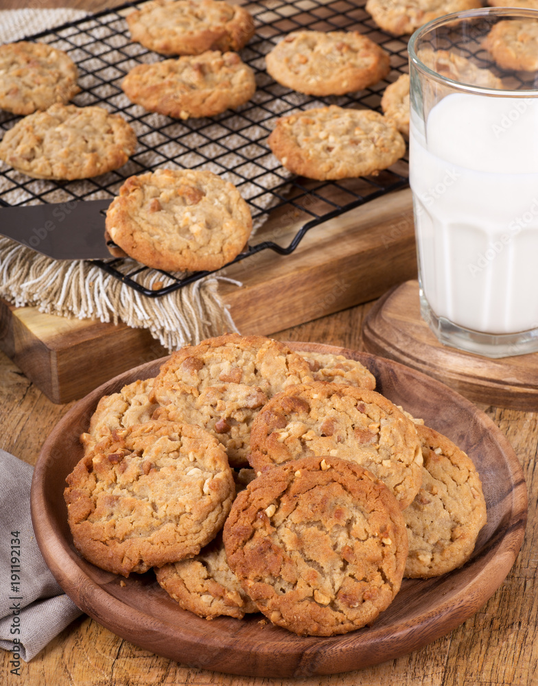 Plate of peanut butter cookies and a glass of milk Plate of peanut butter cookies and a glass of milk