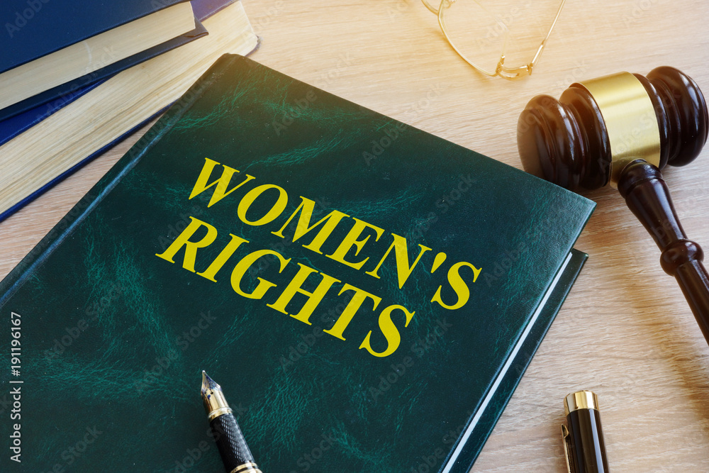 Book with name Women's rights in a court. Gender Equality concept. Book with name Women's rights in a court. Gender Equality concept.