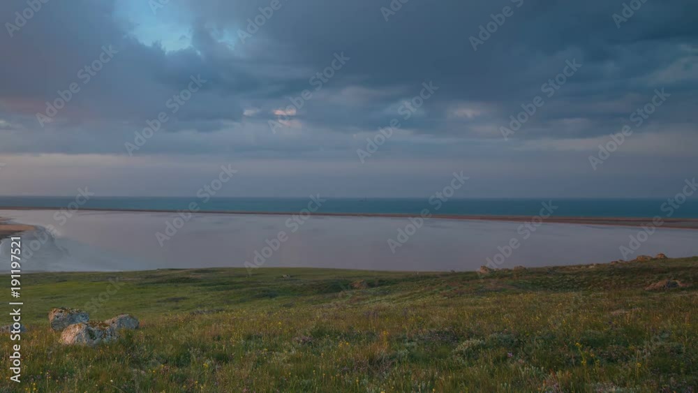 Russia, time lapse. The movement of clouds in the spring in the steppe part of the Crimea peninsula at Cape Opuk. Russia, time lapse. The movement of clouds in the spring in the steppe part of the Crimea peninsula at Cape Opuk.