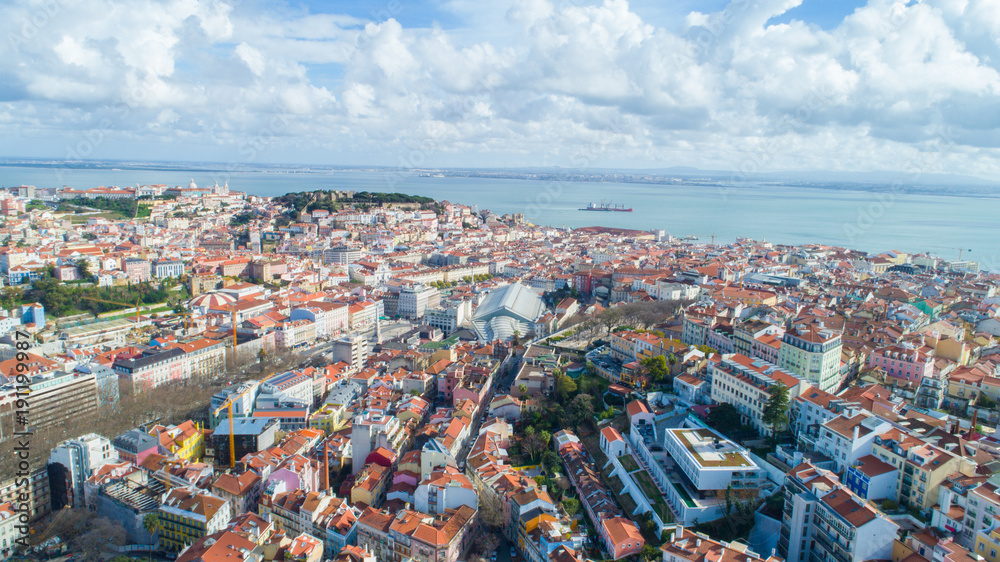 Panoramic view of Lisbon,Portugal town center form the of the many viewpoints parks.Architecture and culture in Europe.Tourist attraction.Beautiful view form the miradouro to the river and the bridge