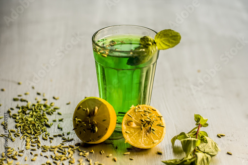 Fennel,variyali or Foeniculum vulgare juice/shrbat with sliced lemons,Citrus × limon photo