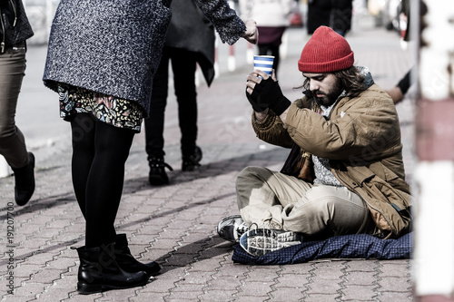 Fotografija Woman giving money
