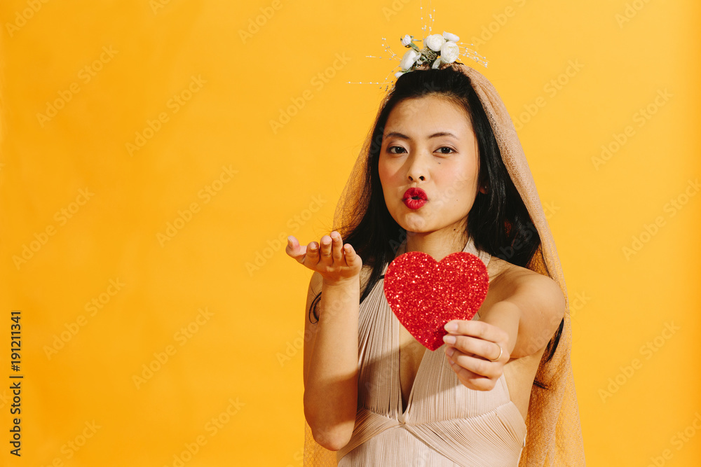 Woman blowing a kiss Woman blowing a kiss