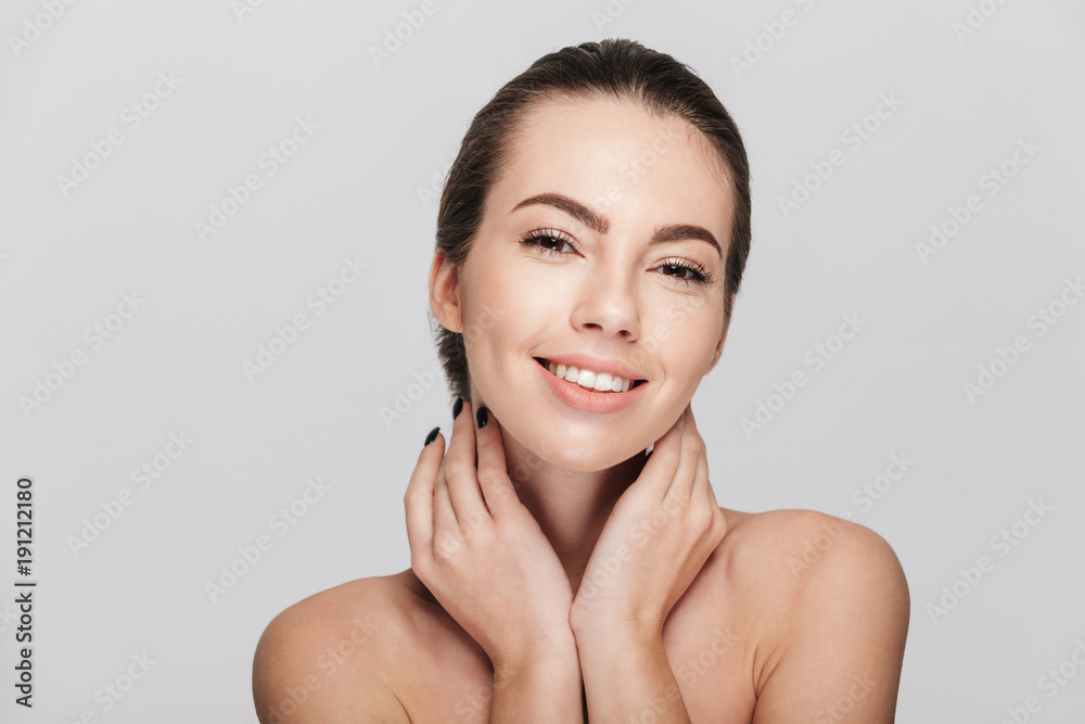smiling young woman with perfect skin isolated on white smiling young woman with perfect skin isolated on white