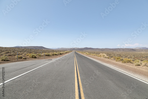 A straight highway running through Death Valley in California. 