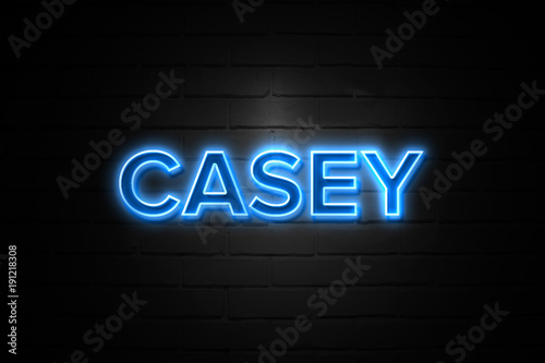 Casey neon Sign on brickwall photo