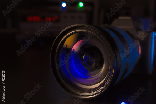 Photo Camera or Video lens close-up on black background DSLR objective