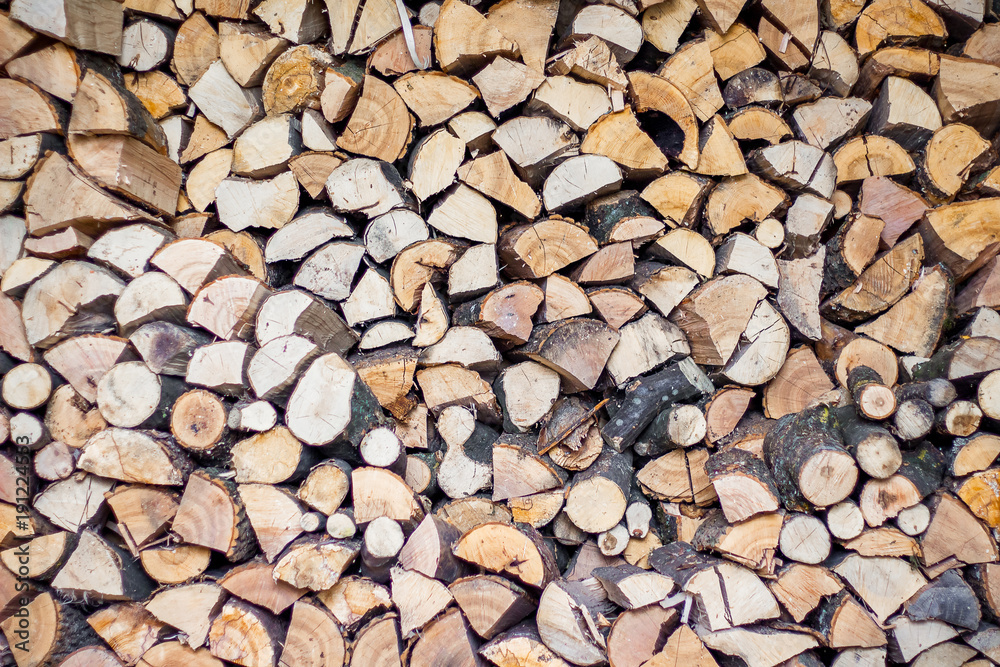 neatly stacked firewood, fuel in the cold winter, a pattern for creativity neatly stacked firewood, fuel in the cold winter, a pattern for creativity