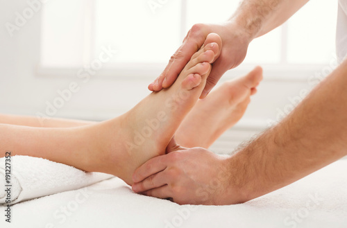 Feet massage closeup, acupressure