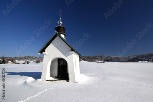 Wayside chapel in winter, Zdynia, Beskid Niski, Poland