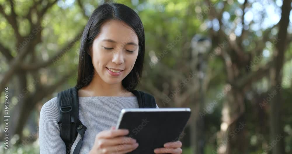 Young Woman use of tablet computer Young Woman use of tablet computer