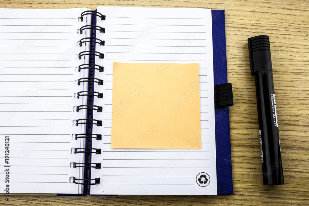 Open note book with stickies on wooden background.3D illustration Open note book with stickies on wooden background.3D illustration