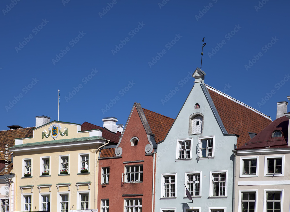 Bright houses on the Town hall square. Old city, Tallinn, Estonia