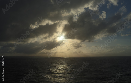 Cloudy sunset over the Caribbean Ocean © Martina