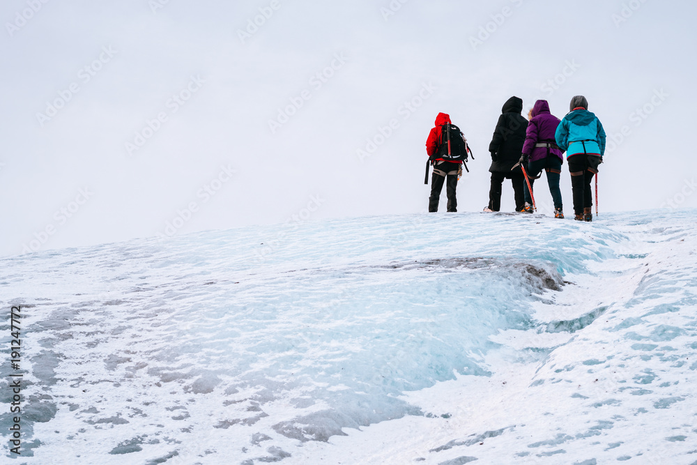mountaineers hiking a glacier