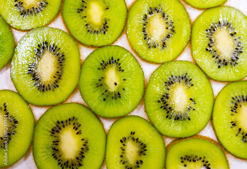 fresh kiwi fruit slices background