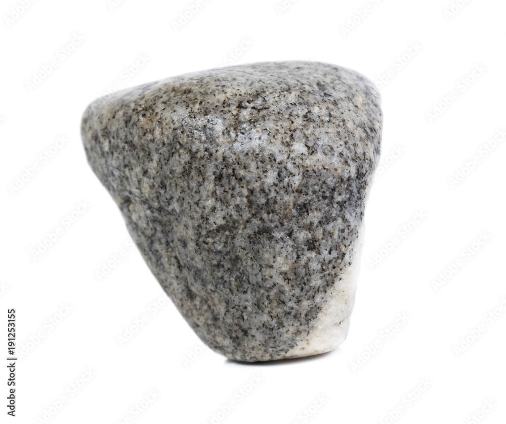 Single natural stone on white background, close-up Single natural stone on white background, close-up