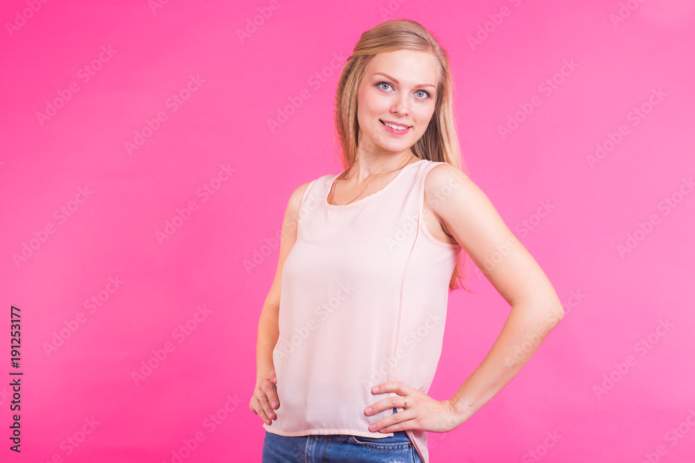 Happy Blonde Woman on pink background. Smiling Fashion Model with Hairstyle Happy Blonde Woman on pink background. Smiling Fashion Model with Hairstyle