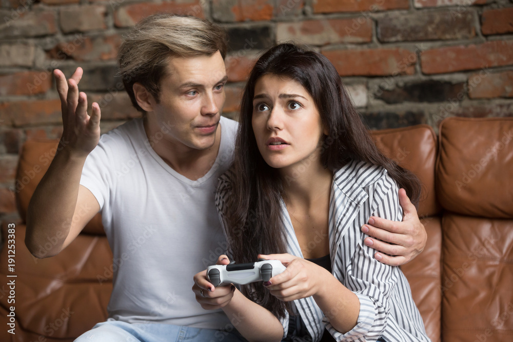 Annoyed Girlfriend Waiting for Boyfriend To Stop Playing Video-games Stock  Photo - Image of game, gamer: 100430632