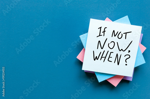 If Not Now When, text on a stack of note paper. Motivating and inspiring question, mockup and template with empty space for text photo