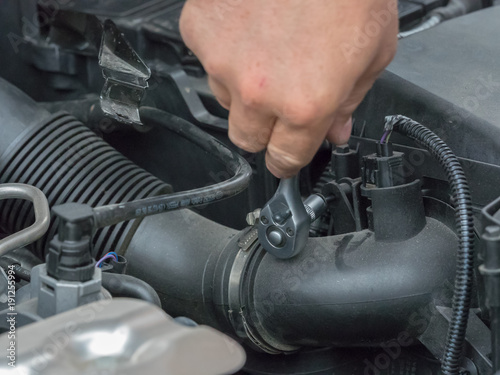 Tightening bolt under hood