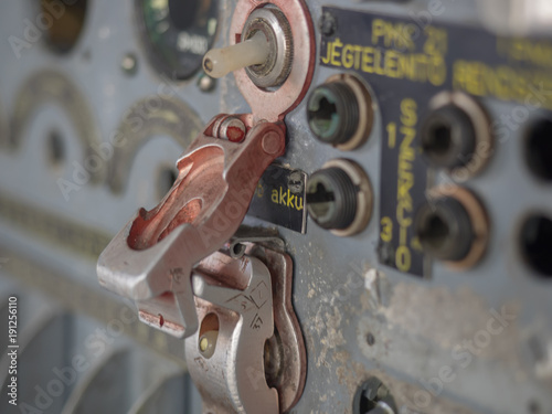Battery switch in cockpit of plane