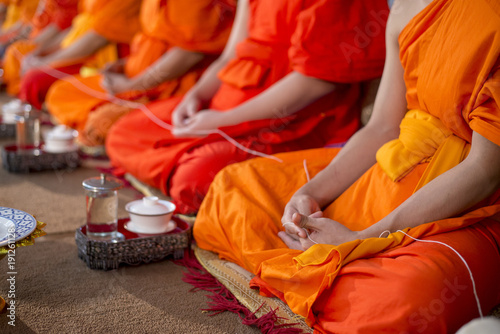 Fotografie Close up of Thai monk in wedding ceremony