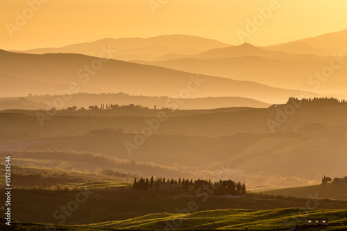 View of rolling countryside at sunset, Pienza, Tuscany, Italy