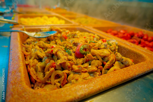 Delicious food inside of plastic trays served at traditional Mayan restaurant , Playa del Carmen, Mexico photo