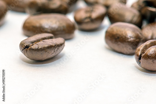 Coffee beans closeup on white background