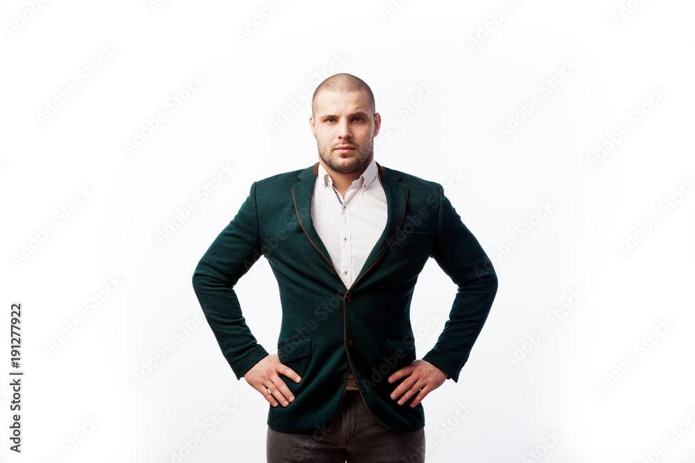 Elegant businessman looking at camera with reliability isolated on white background Elegant businessman looking at camera with reliability isolated on white background