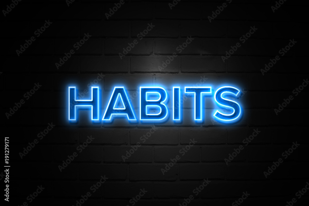 Habits neon Sign on brickwall