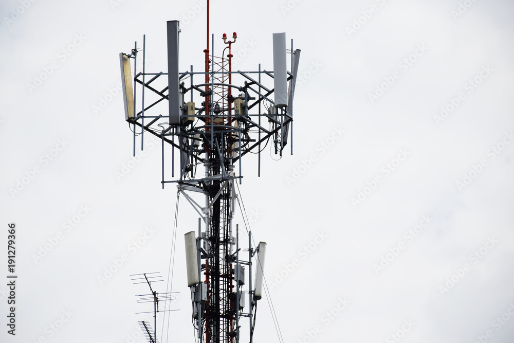 telecommunications cellular tower on building roof telecommunications cellular tower on building roof