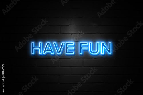Have Fun neon Sign on brickwall