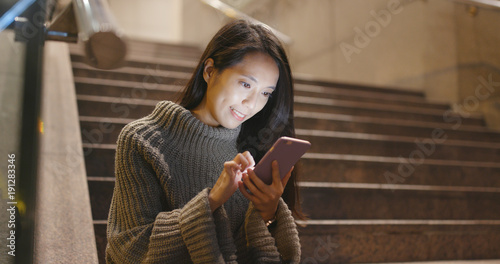 Photography Woman use of mobile phone at outdoor