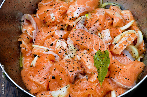 Salmon being prepared for marination