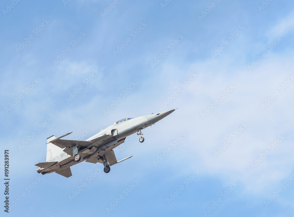 fighter jet military aircrafts flying with high speed  on blue sky 