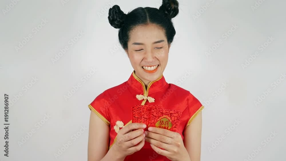 4k video of beautiful woman wear cheongsam and holding red envelope and counting money in concept of happy chinese new year 4k video of beautiful woman wear cheongsam and holding red envelope and counting money in concept of happy chinese new year