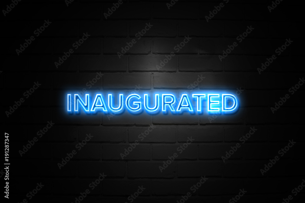 Inaugurated neon Sign on brickwall Inaugurated neon Sign on brickwall
