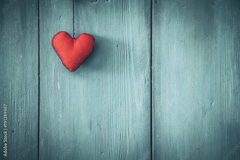 Red heart shape, wooden background Red heart shape, wooden background